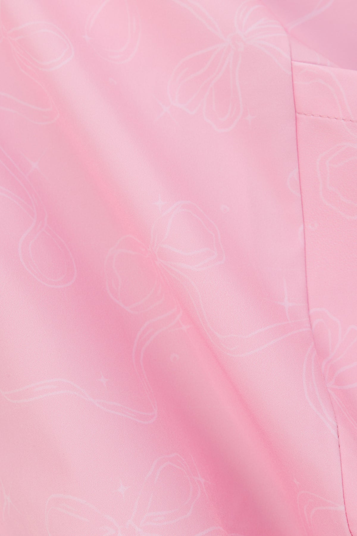 Close-up of Hero Scrubs Pink scrub fabric showing the subtle tonal print