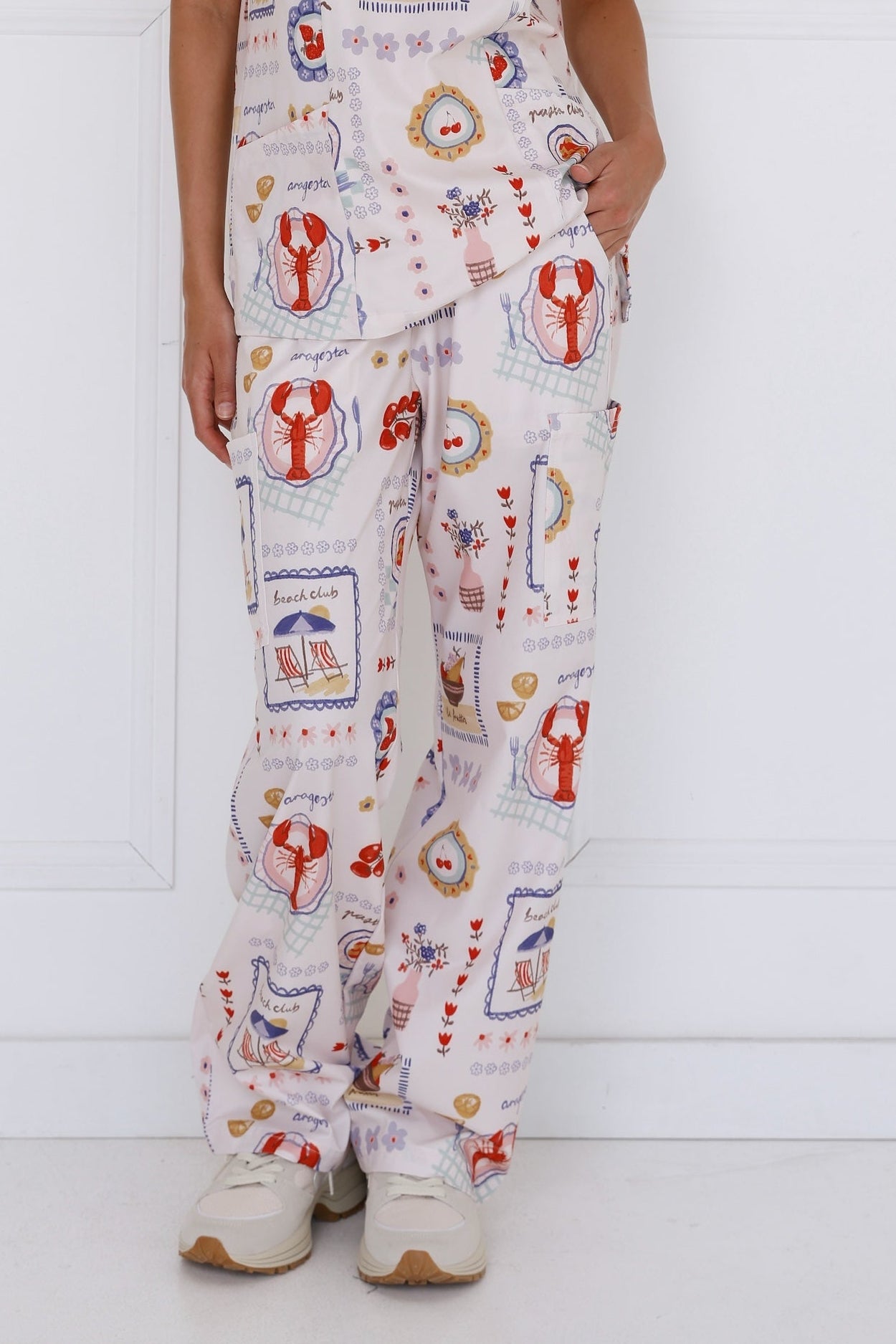 Positano Women’s Performance Scrub Pants - full front view showing modern tailored fit and stretch fabric