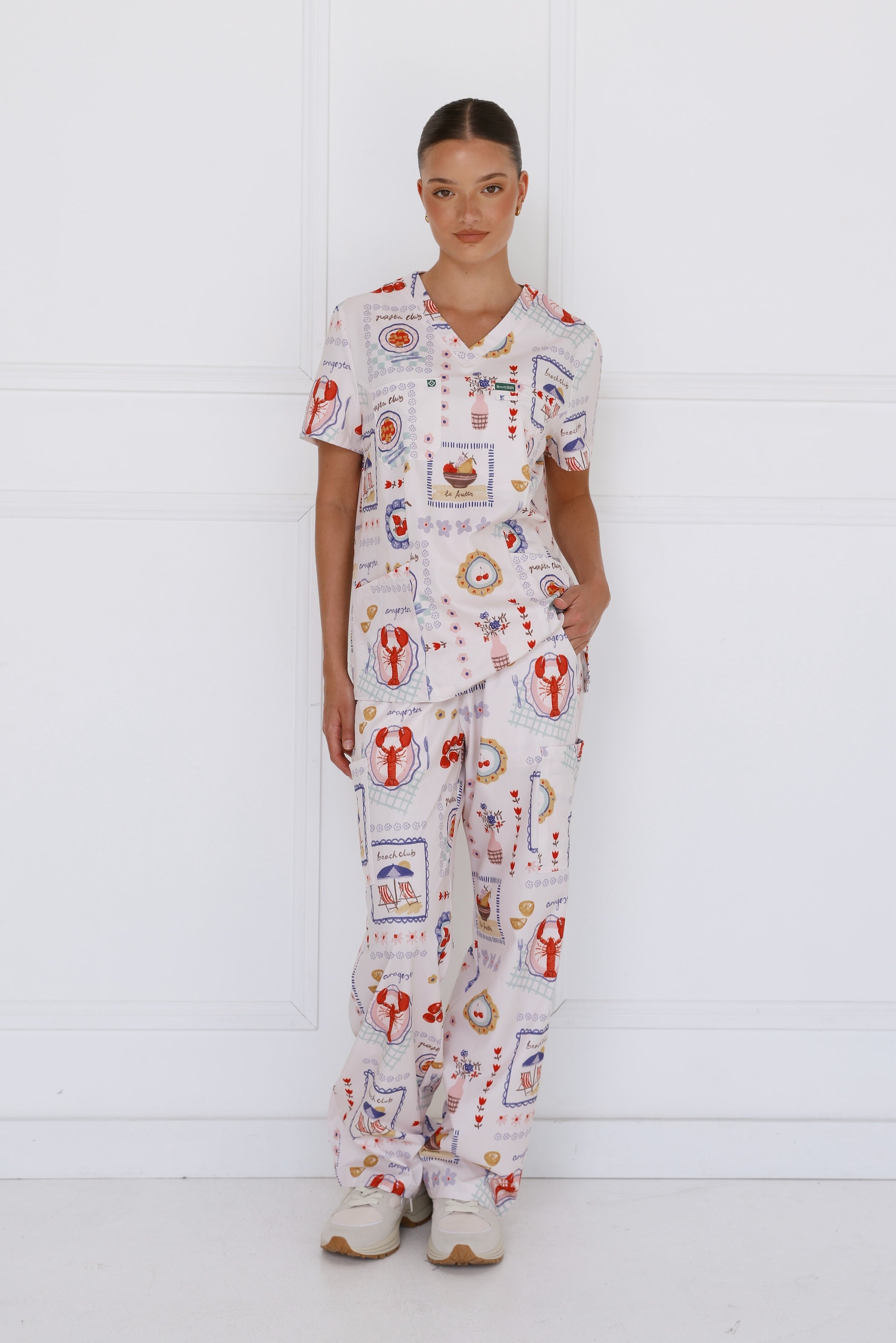 Positano Women’s Performance Scrub Pants - full front view showing modern tailored fit and stretch fabric
